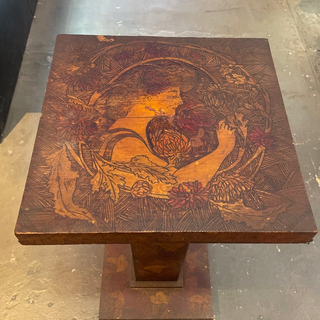 Art Nouveau pyrography stand Woman with floral motif and botanicals on base Circa 1900