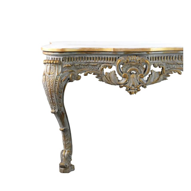 It exudes a rich Rococo decorative style, popular in 18th-century France and often used to showcase the luxury of palaces...