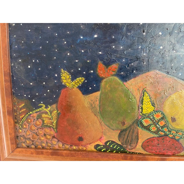Painting of pears with a moon in a starry sky, with deep colors and patterns. Purchased in Santa Fe, New Mexico. I believe...