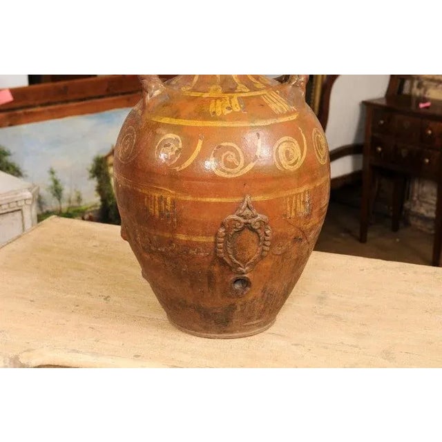 17th Century Italian Terracotta Olive Oil Jar with Yellow Glazed Spiraling Décor For Sale In Atlanta - Image 6 of 13