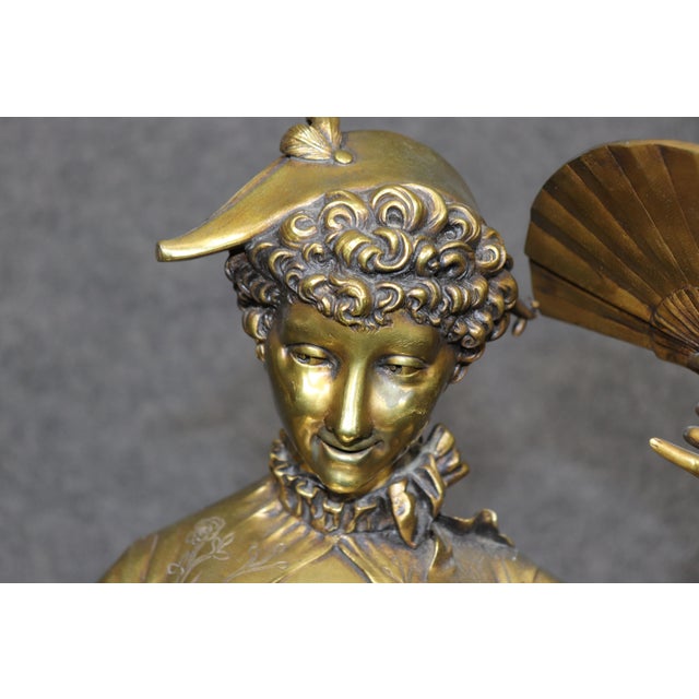 An elegant and highly romantic gilt bronze figural sculpture signed by the celebrated French sculptor Paul Dubois,...