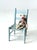 This charming antique children's chair features a rustic ladder back and woven splint seat. Painted in a light blue with a...