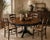 Late 20th Century Colonial Revival Pedestal Dining Table | Old Town Chapel™ Aged Hickory Finish | 42" Round Extending to...