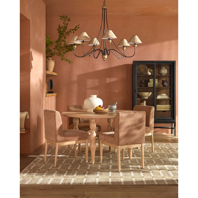Introducing the Macie Dining Table, a stunning centerpiece for any dining area that effortlessly blends style and...