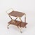 Marvelous and unique mid-century bar trolley entirely crafted in brass, wood and Formica. This refined serving cart was...