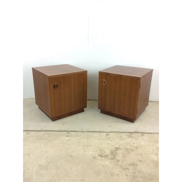 This pair of Danish modern end tables feature pressed wood construction, beautiful teak veneer with original finish,...
