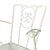 Wrought iron garden chairs painted white.