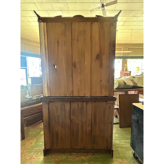 Item: Secretary bookcase. Style: Henry II style (Renaissance Revival). Maker: Unknown. Materials/finish: Dark-stained oak,...
