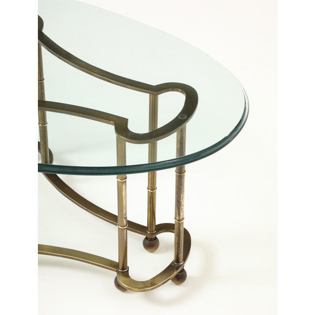 1970's Mid-Century Modern brass base with oval glass top racetrack coffee table by Mastercraft, in vintage original...