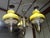 Complete chandelier from the 1970s, with an imposing brass frame, three frosted white glass shades shaped like oil lamps,...