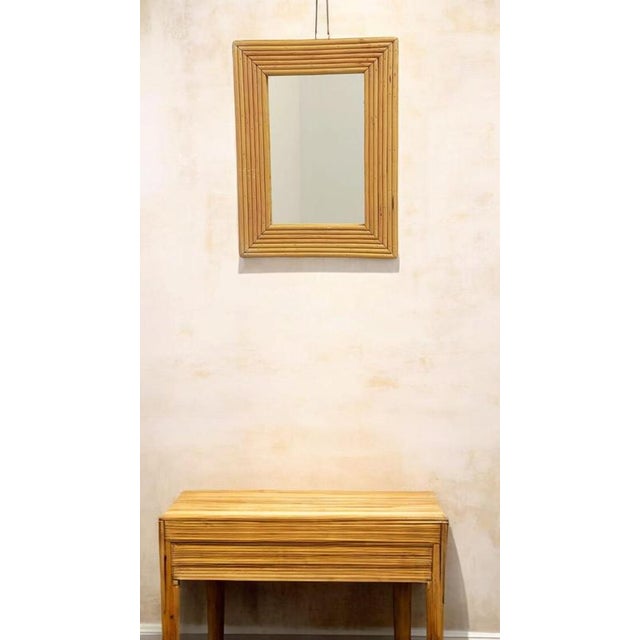 Charming french riviera mid-century rattan mirror, circa 1960s a lovely small french riviera rattan mirror, handmade in...