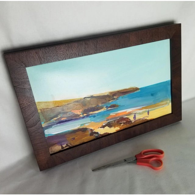 Painting by a Portuguese artist on heavy paper recently framed with a dark wood moulding. We just love the colors! We have...