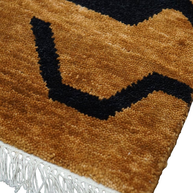 Inspired by the stripes of the mythical creature that are story-told in the mountains of Tibet, the black stripes of...