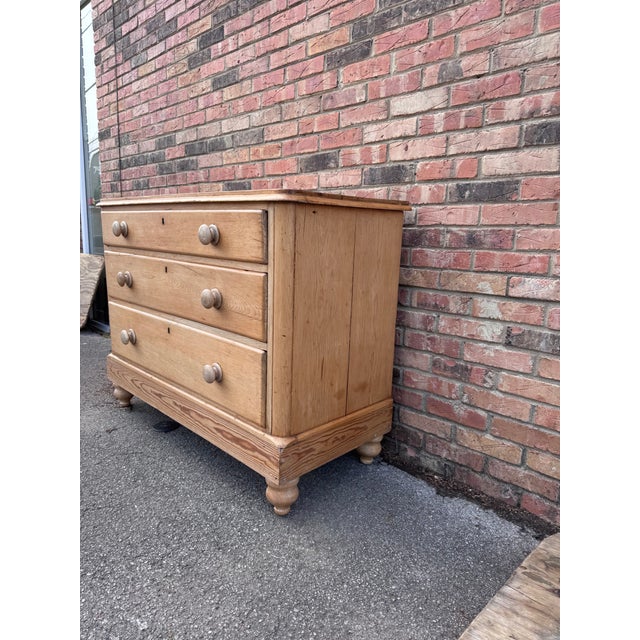 This is a lovely antique pine chest! This piece dates to the 19th century and has lovely blonde patina. The wood has a...