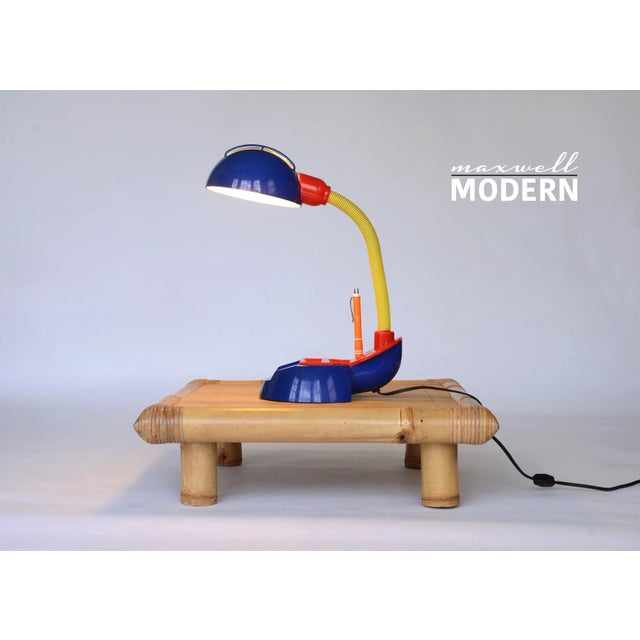 Awesome rare vintage tricolor plastic desk lamp. This fun whimsical design recalls the strong Memphis influence of the 80s...