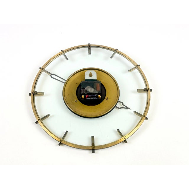 Vintage Glass & Brass Wall Clock from Diehl, 1950s, in Very Good conditions. Designed 1950 to 1959 This piece has an...