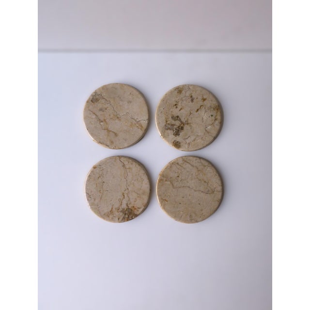A set of four (4) '80s Post-Modern period marble drinks cocktails coasters, circa late-20th century, 1980s. Coasters are a...