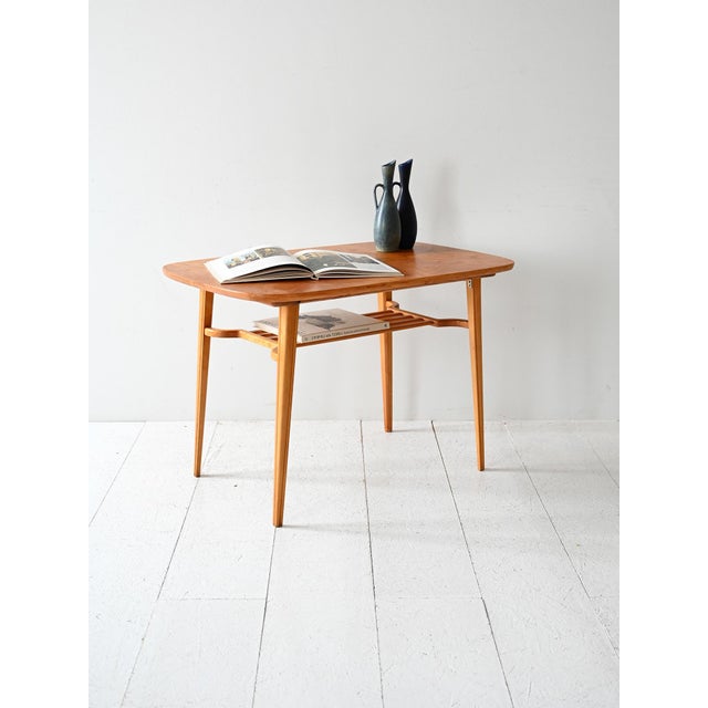 Vintage coffee table with ash veneer top and turned solid beech frame. Original Scandinavian coffee table from the 1960s,...