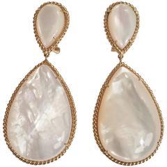 18kt Yellow Gold Mother of Pearl pear-shaped Drop Earrings with elegant rope twist border. The earrings measure...