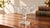 A charming vintage clear cut-glass pedestal compote with a shaped scalloped rim and an elegant combination of wheel-cut...