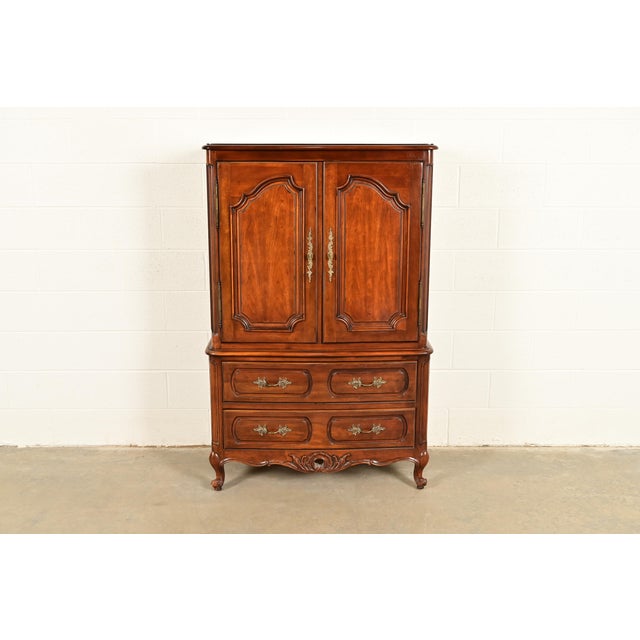 A gorgeous French Provincial Louis XV style armoire dresser, gentleman's chest, or linen press By Century Furniture USA,...