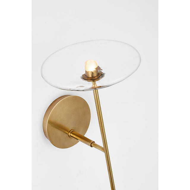 Description: Ian K. Fowler's Calvino employs contemporary lines to form innovative arrangements. Hand-blown glass discs...