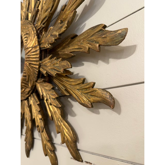 This is a gorgeous gilt wood mirror! Done in sunburst style, there are several multi length layered rays that give an...