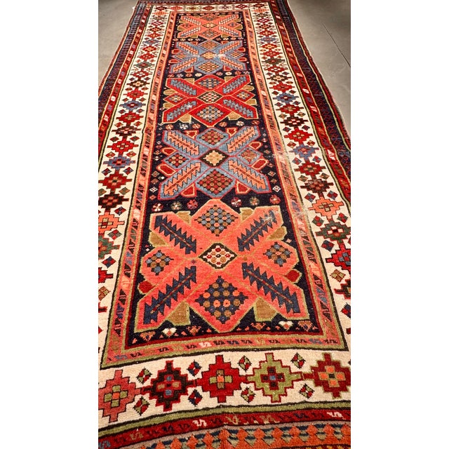 Bright fun color way, rare piece. This is a perfect size for foot of the bed, hallway, kitchen, vanity, or entry way. Late...