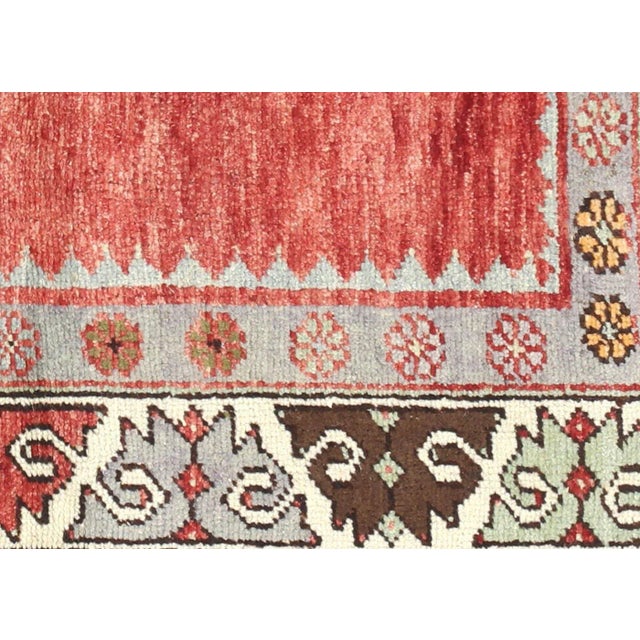 1960s Turkish Oushak Rug. Handwoven with wool on wool foundation in the Oushak region of Western Turkey. The Anatolian...