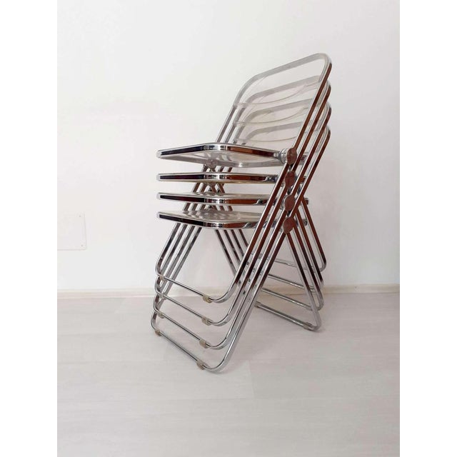 “Plia” model folding chair produced by the world-famous Italian company Anonima Castelli and designed by designer...