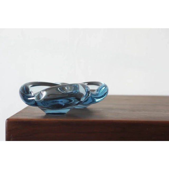 The glass bowl designed by Per Lütken for Holmegaard is one of the most recognizable examples of Danish art glass of the...
