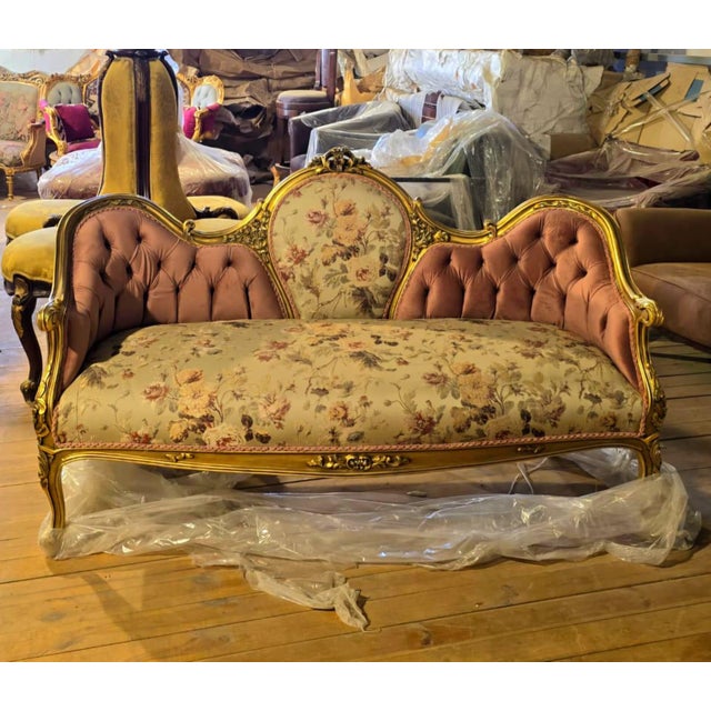 Elegant, romantic, and exceptionally crafted, this grand French Louis XV sofa is a luxurious statement piece inspired by...