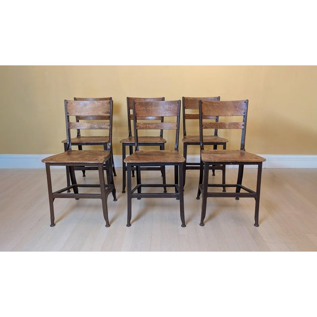 A striking set of six vintage American industrial dining chairs by the Toledo Metal Furniture Company, circa 1940s. Each...