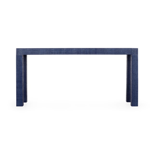Classic lines make this blue raffia wrapped console easy to use in both modern and traditional interiors. Its punch of...
