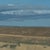 Blue Where It Gathers by Michael Magrin | Oil on Canvas Prairie Landscape With Storm Clouds For Sale - Image 8 of 14