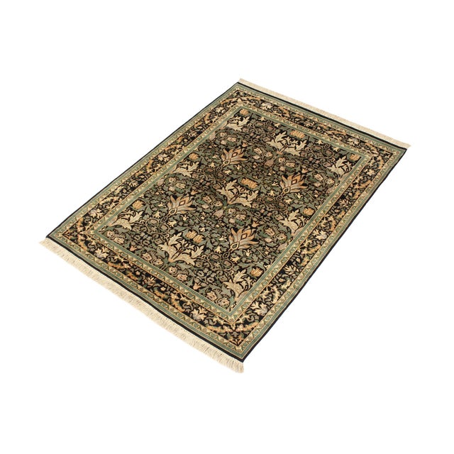 Designed with mesmerizing intricacy and gorgeous color palette, this hand-knotted masterpiece demonstrates the beauty and...