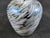 Gorgeous handmade iridescent glass vase. Very small, only three inches tall. There is one tiny chip on the fragile edge on...