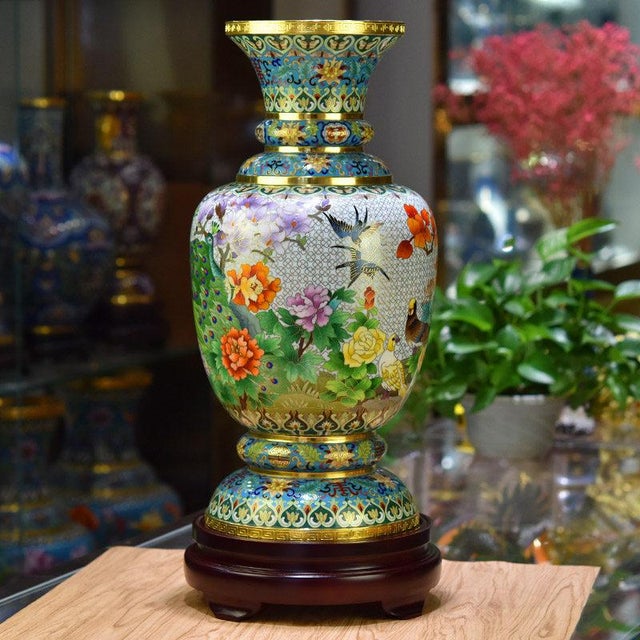 This is a magnificent, large-scale cloisonné enamel vase, officially titled "Song of Prosperity" (盛世欢歌). Created by...