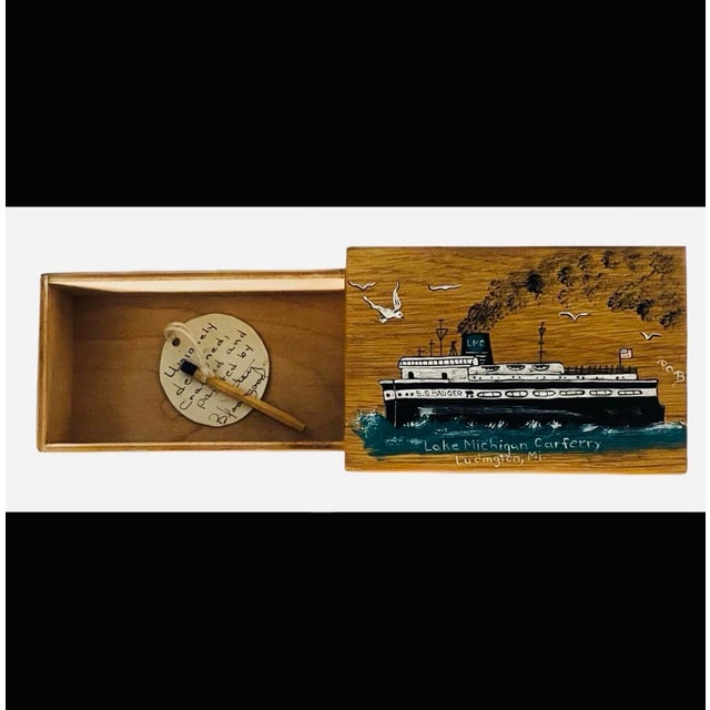 rare vintage hand-painted wooden slide-out matchbox by renowned regional artisan Patsy Bloodgood. Crafted from solid...