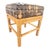 Unique vintage tropical-style stool featuring a beautifully crafted rattan frame with intricate wrapped and woven...