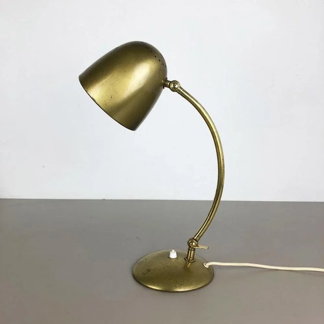 Article: Table light Origin: Germany Producer: Cosack lights, Germany attributed Material: Metal Age: 1960s Description:...