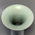 This elegant antique Gu vase (flower gu) is crafted in classic Chinese Longquan celadon style. It has a wide flared mouth,...