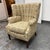 Design Plus Gallery presents a Vintage Channel Tufted Arm Chair. This high-back lounge chair has a winged profile, rolled...