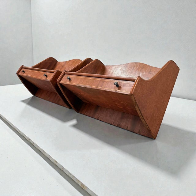 Pair of wall-mounted teak nightstands | denmark, 1960s set of danish wall-mounted nightstands executed in teak and...