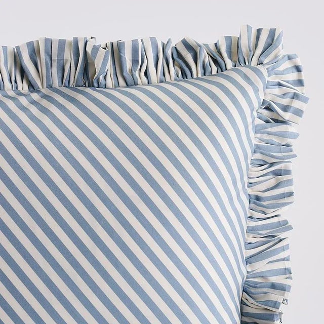 This pillow features Brigitte Stripe with a fringe finish. The perfect thin stripe, not too casual and not too dressy....