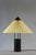 A distinctive Le Klint Model 389 uplighter, combining a black lacquered metal structure with an original vertically...