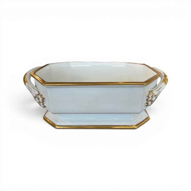 A beautiful example of 19th century European craftsmanship, this porcelain jardinière features elegant hand-painted...