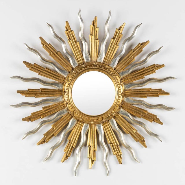 Gold and Silver mid-Century Giltwood Vintage Sunburst Mirror Granati Bois Sculptie, C.D.V. Brussels, Belgium; ca. 1970s...