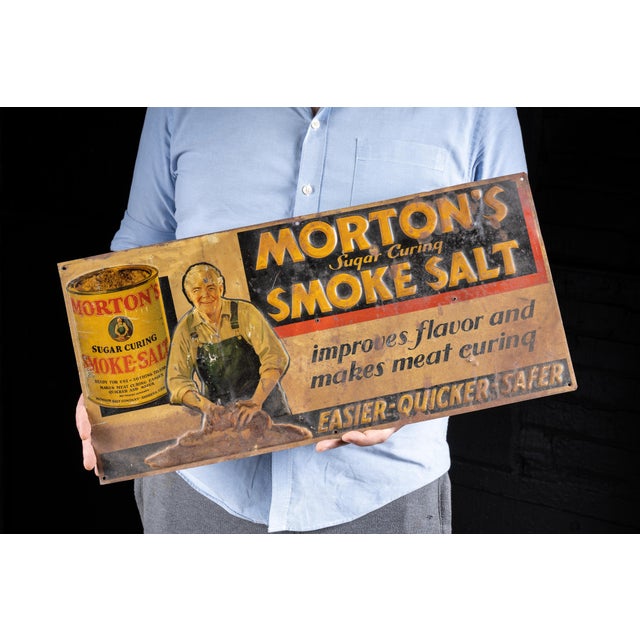 c. 1940s - 1950s; Morton Salt Co. - Chicago Embossed tin advertising sign for Morton's Smoke Salt, a product formulated to...