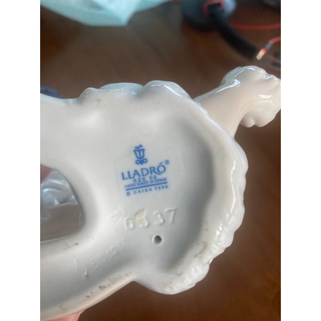Genuine Lladró porcelain poodle, made in Spain. Lladró is a collectible Spanish porcelain company known for its delicate,...